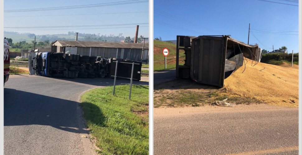 Carreta carregada com milho tomba na marginal da BR-101 e deixa três feridos