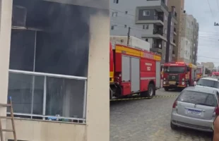 Moradores salvam mãe e filho autista de incêndio em residência em Camboriú